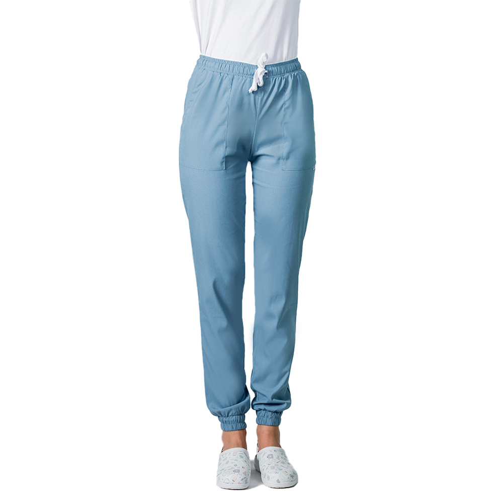 Niebieski elastyczny kombinezon medyczny, bluzka typu kimono z białą lamówką i spodnie typu jogger